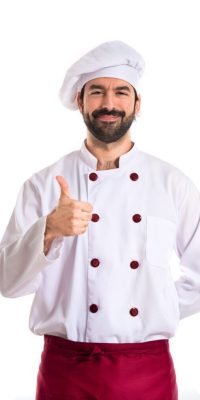 Chef with thumb up over white background